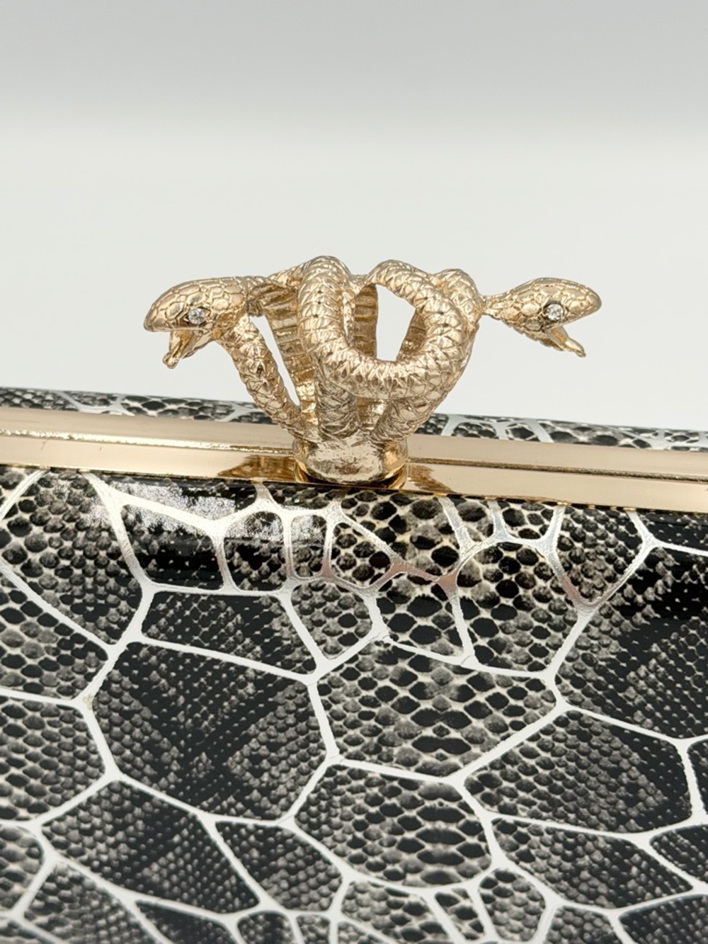 Elegant Metallic Snake-Pattern Clutch with Gold Snake Closure - Picture 5 of 8